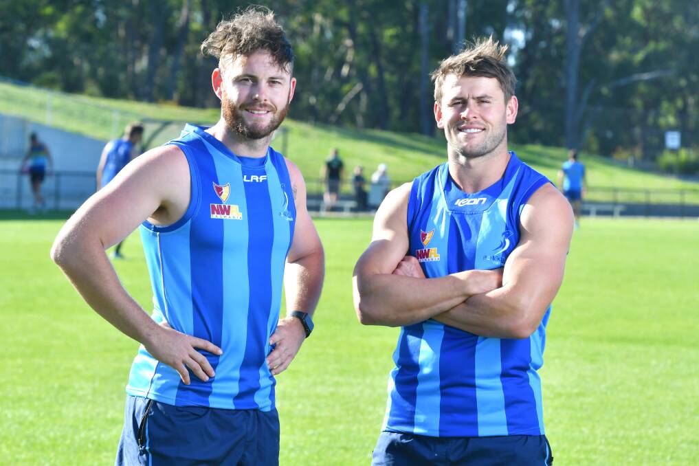 TOGETHER AGAIN: Former AFL players Luke Russell and Maverick Weller at Penguin training this week. Weller is coaching the Two Blues, with Russell an assistant. Picture: Brodie Weeding