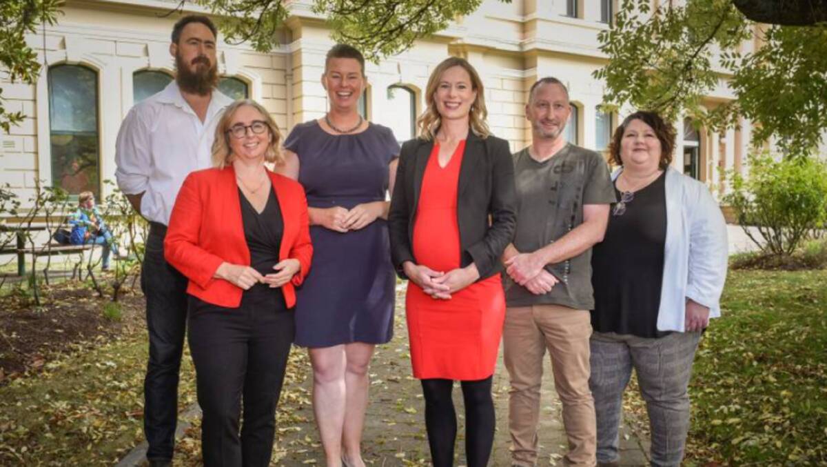 Labor's Bass ticket with Janie Finlay (third from the left) and Jennifer Houston (right).