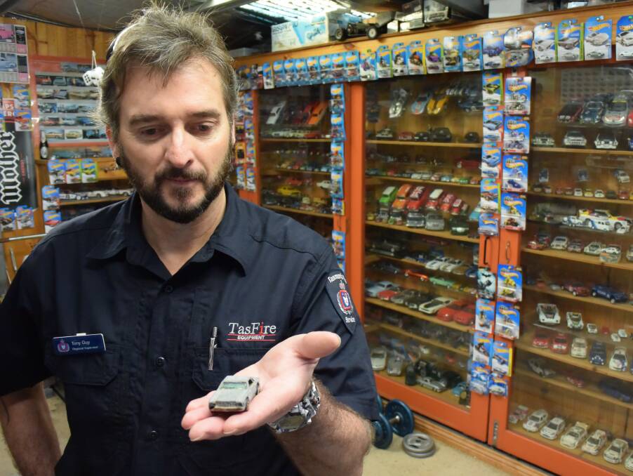 MODEL JOURNEY: Mr Guy with one of his first ever Hot Wheels models.