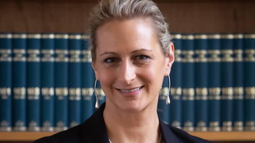Well-respected human rights lawyer Regina Weiss was appointed by Tasmania Police to investigate whether Paul Reynolds used his position as a police officer to groom young people and commit child sexual abuse. 