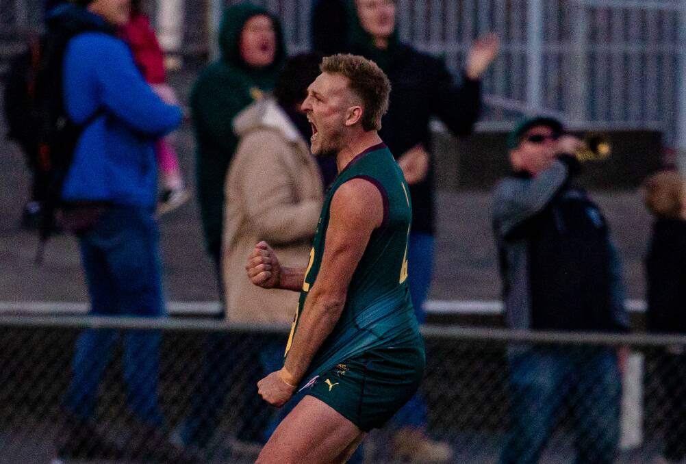 Jake Hinds celebrates his match-tying goal in the final minutes of Tasmania's win over Queensland. Picture by Solstice Digital