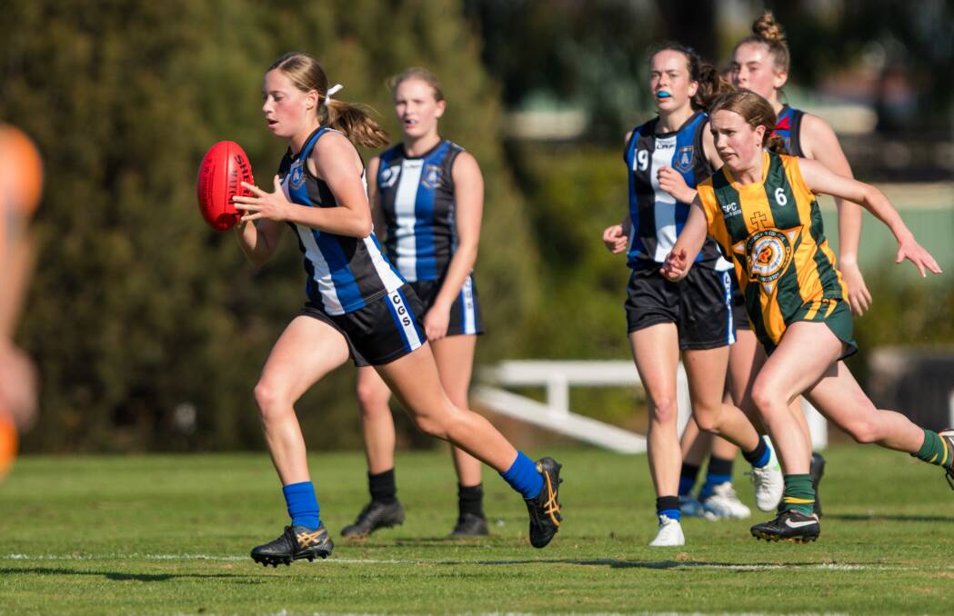 Ava Curtis playing school football for Launceston Grammar in 2021. Picture by Phillip Biggs