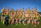 The St Pat's girls' team celebrate SATIS premiership victory over Guilford Young, their first since 2018. 