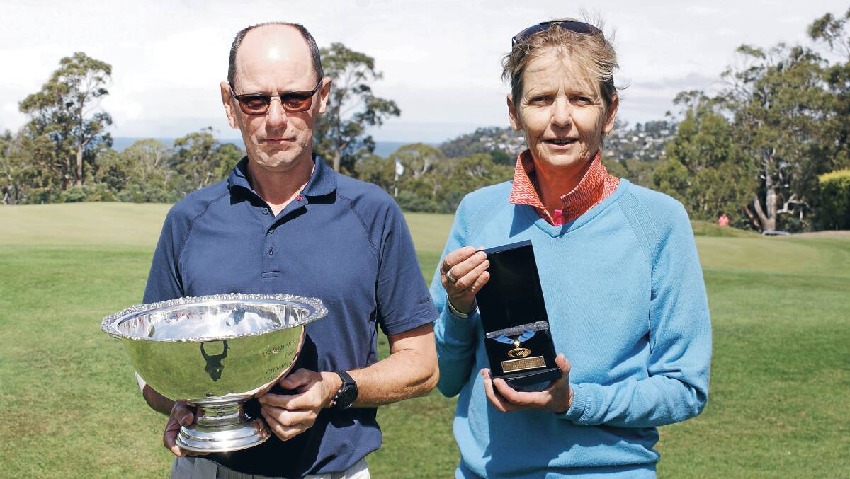 Top dogs: Shayne Walker and Tammy Hall celebrate victory in the Tasmanian senior open titles. Pictures: Golf Tasmania 