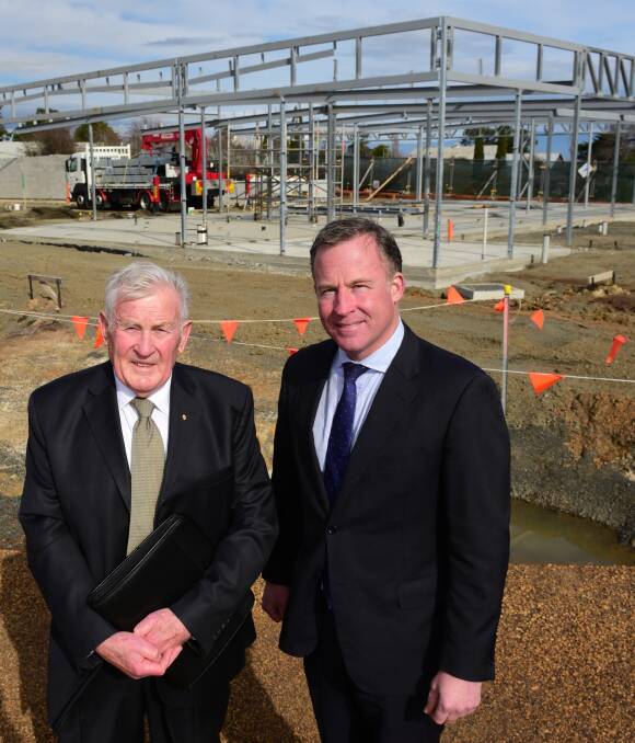 SOLID GROUND: Woolmers Estate chairman Peter Rae and Premier Will Hodgman at the unveiling of the foundation stone of the Nigel Peck Centre.  Picture: Paul Scambler