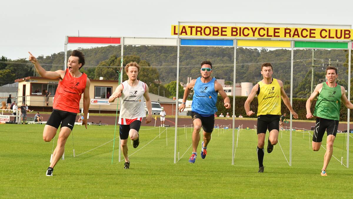 Not so easy next time: Jack Hale (red) celebrates his win in the Latrobe Gift, but will be dragged back 1.5m for the Burnie Gift. Pic: Brodie Weeding.