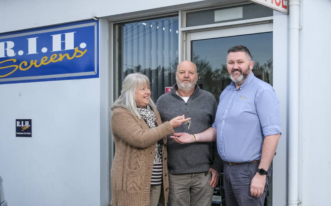 Roderick and Shona Hodge hand over the keys to Callum Bartley. Picture: Craig George