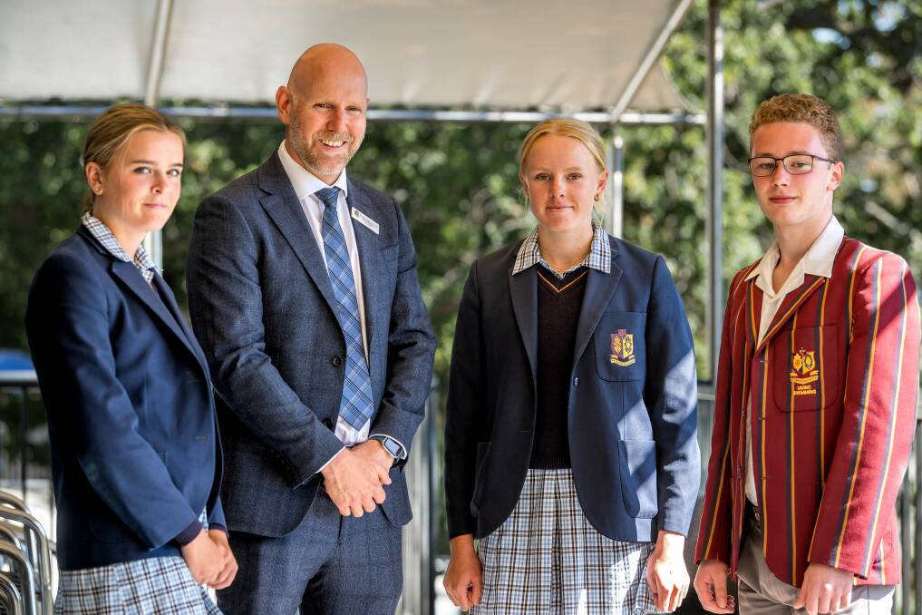 Scotch Oakburn College's new principal Ross Patterson, pictured with Year 11 students Ashlea Reed and May Wain, and year 12 student Xavier Nesbit. Picture by Phillip Biggs