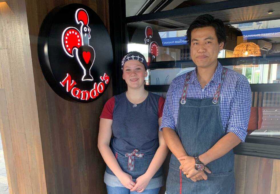 Frances McKenzie and Peter Yau at one of Tasmania's two Nando's stores. Supplied picture