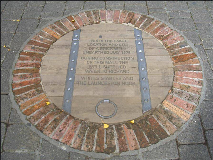 A plaque in the Quadrant today, marking the site of the water well servicing the Launceston Hotel in the early days under Dick White. Picture supplied