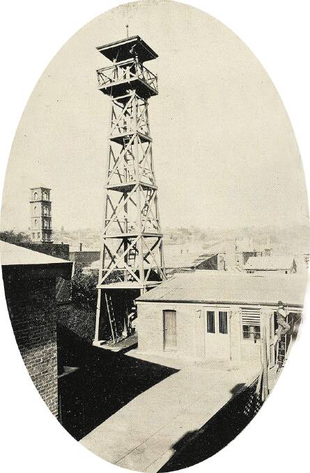 The Paterson Street fire station and tower in 1910. This 60ft wooden tower was demolished and replaced with steel in 1938. The Brisbane St tower can be seen in the background. Picture: Weekly Courier, September 8, 1910.