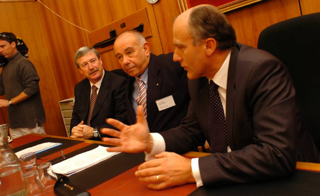 FLASHBACK: Then Tasmanian deputy premier Bryan Green along with former West Tamar mayor Barry Easther and Tasmanian Liberal senator Eric Abetz at the Beaconsfield Mine recovery taskforce gathering in 2006. 
