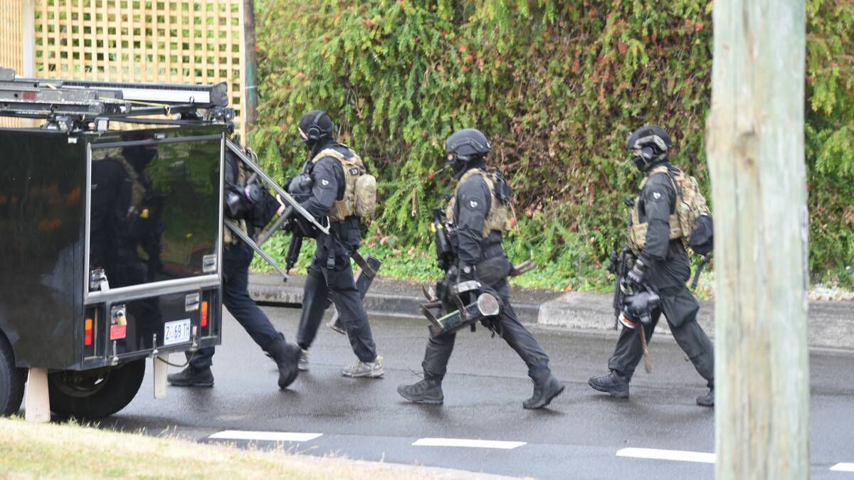 MORE NEEDED: SOG-ies in action at the Trevallyn siege last December. 