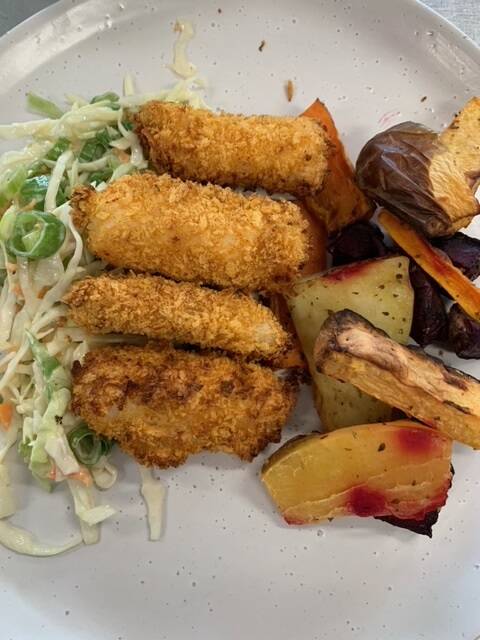 School Food Matters' 100 per cent Tasmanian fish fingers, with vegie wedges and coleslaw