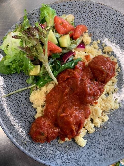 School Food Matters' Meatballs in pasta sauce, cous couse and garden salad. 