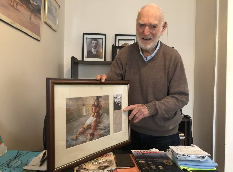 IMMORTALISED: Bird has a framed facsimile of Dale Marsh's painting depicting Teddy Sheean's courageous last stand.