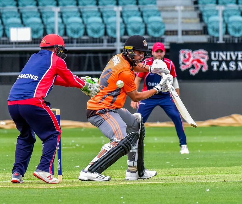 FINE TOUCH: Raiders allrounder Ollie Wood looks to guide the ball through the vacant slips cordon past North Hobart wicketkeeper Jake Doran In Saturday's Twenty20 game at UTAS Stadium. Pictures: Neil Richardson
