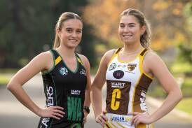 Cavaliers 19 and under netballer Ella McArthur and Hawks midcourter Mia Boyd at City Park. Pictures by Phillip Biggs 