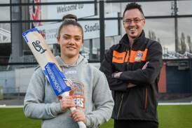 Greater Northern Raiders' Emma Manix-Geeves and women's coach Darren Simmonds at the UTAS training nets in 2020. Picture by Paul Scambler