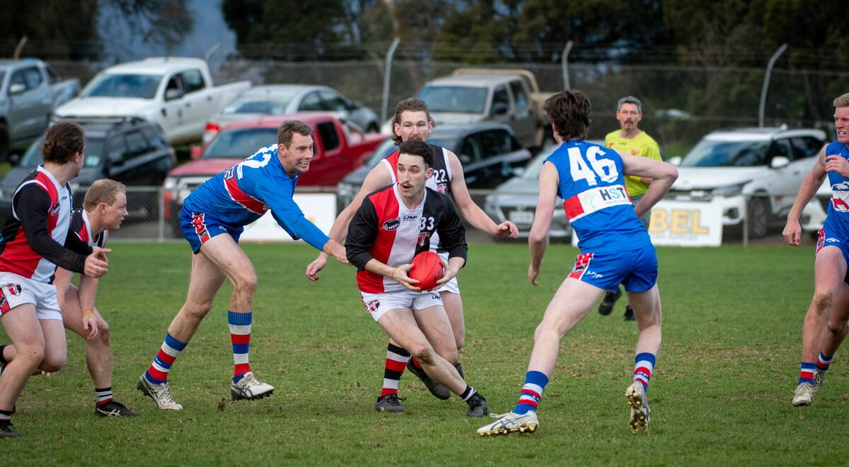 George Town's Brady Gee in action against South Launceston at Youngtown Oval in 2022. The Saints will play there again this weekend. Picture by Paul Scambler