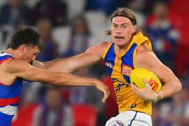 Harley Reid's physical approach is one of the strong points of his game, coach Adam Simpson says. (Morgan Hancock/AAP PHOTOS)