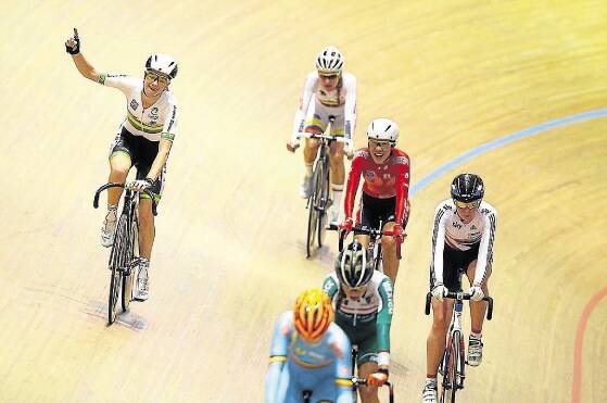  Amy Cure celebrates winning the Women's Points race during day four of the 2014 UCI Track Cycling World Championships.