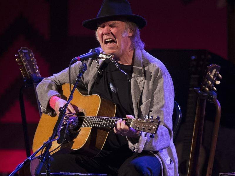 Neil Young and Crazy Horse began their Love Earth Tour in April. (AP PHOTO)