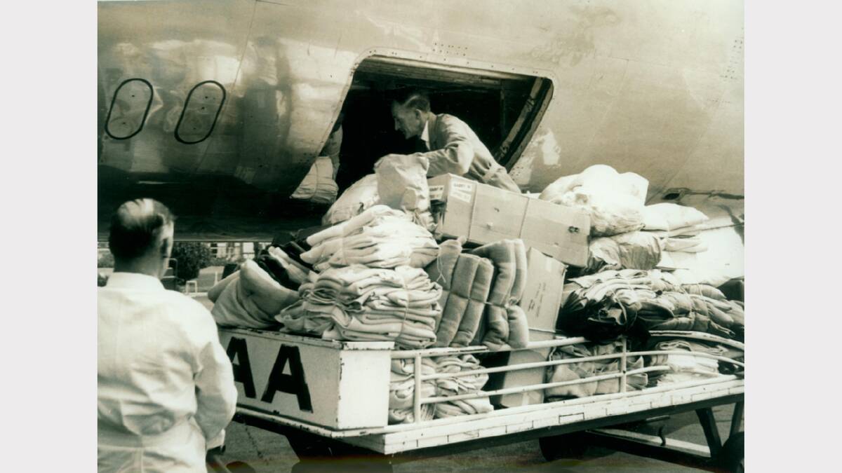 1967 Bushfires: Supplies arrive on a TAA flight into Hobart airport.