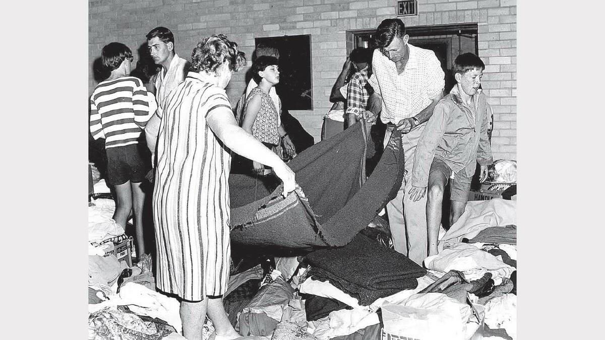 1967 Bushfires: Volunteers pack donated goods at Launceston's Salvation Army Citadel on February 7 after Mayor Pryor opened an appeal.