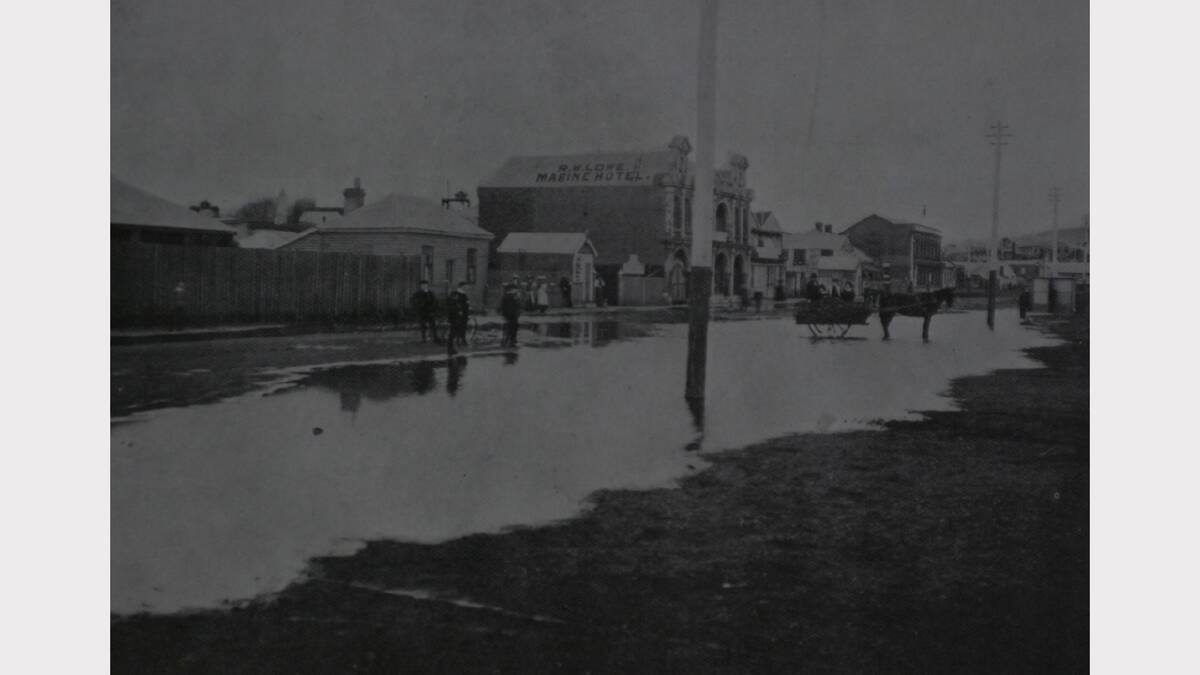 1929 Floods: Flood waters affected lower Charles Street. The Weekly Courier, April 1929.